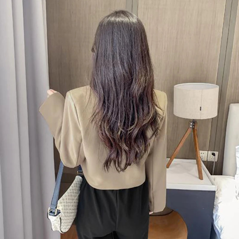 Light brown cropped blazer for women by Lamp Post, designed for winter, shown on a model with a stylish, tailored fit.