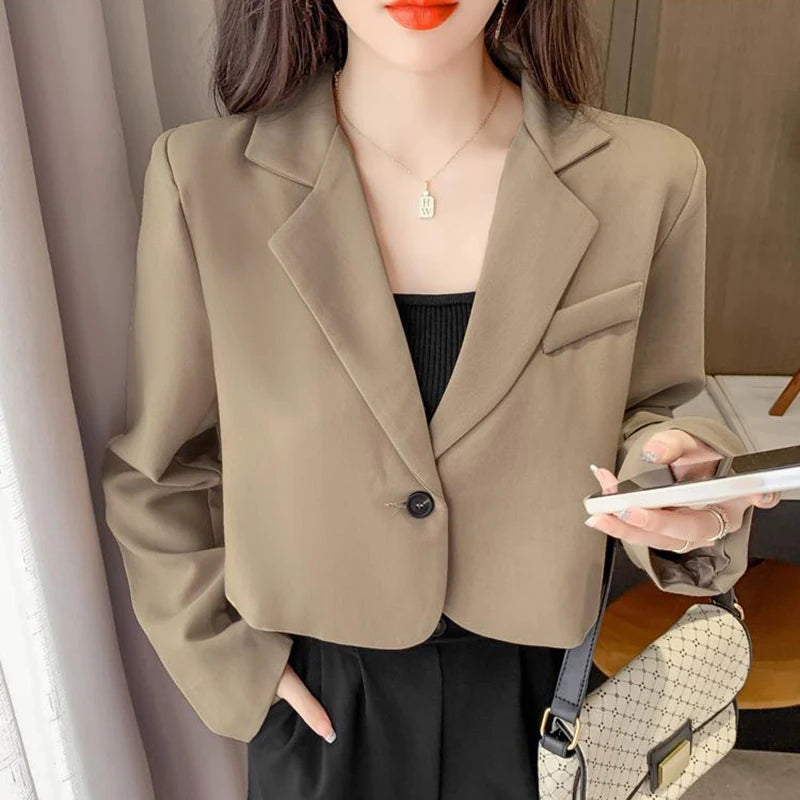Light brown cropped blazer for women by Lamp Post, styled as a winter jacket, perfect for 2024 women's fashion.