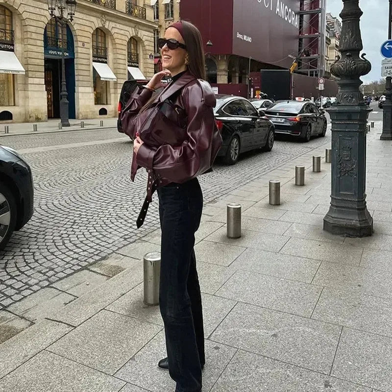 Women’s burgundy winter jacket by Lamp Post with long sleeves, zipper pockets, and elegant design for winter wear.