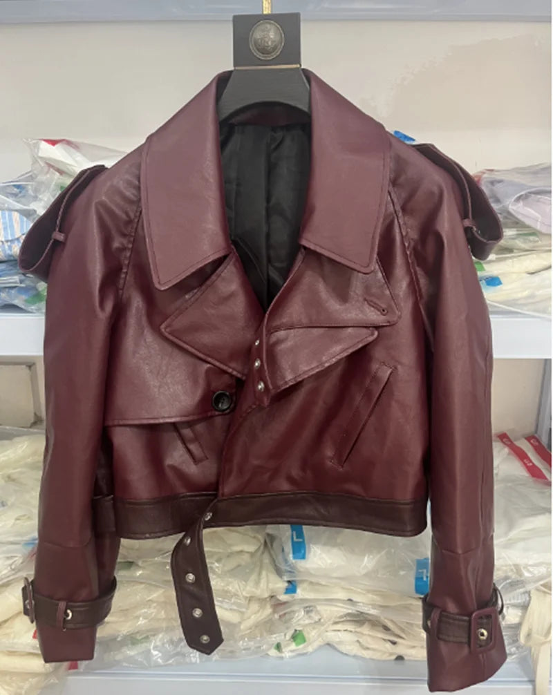 Elegant burgundy women's winter jacket by Lamp Post with long sleeves, zipper pockets, perfect for cold weather.