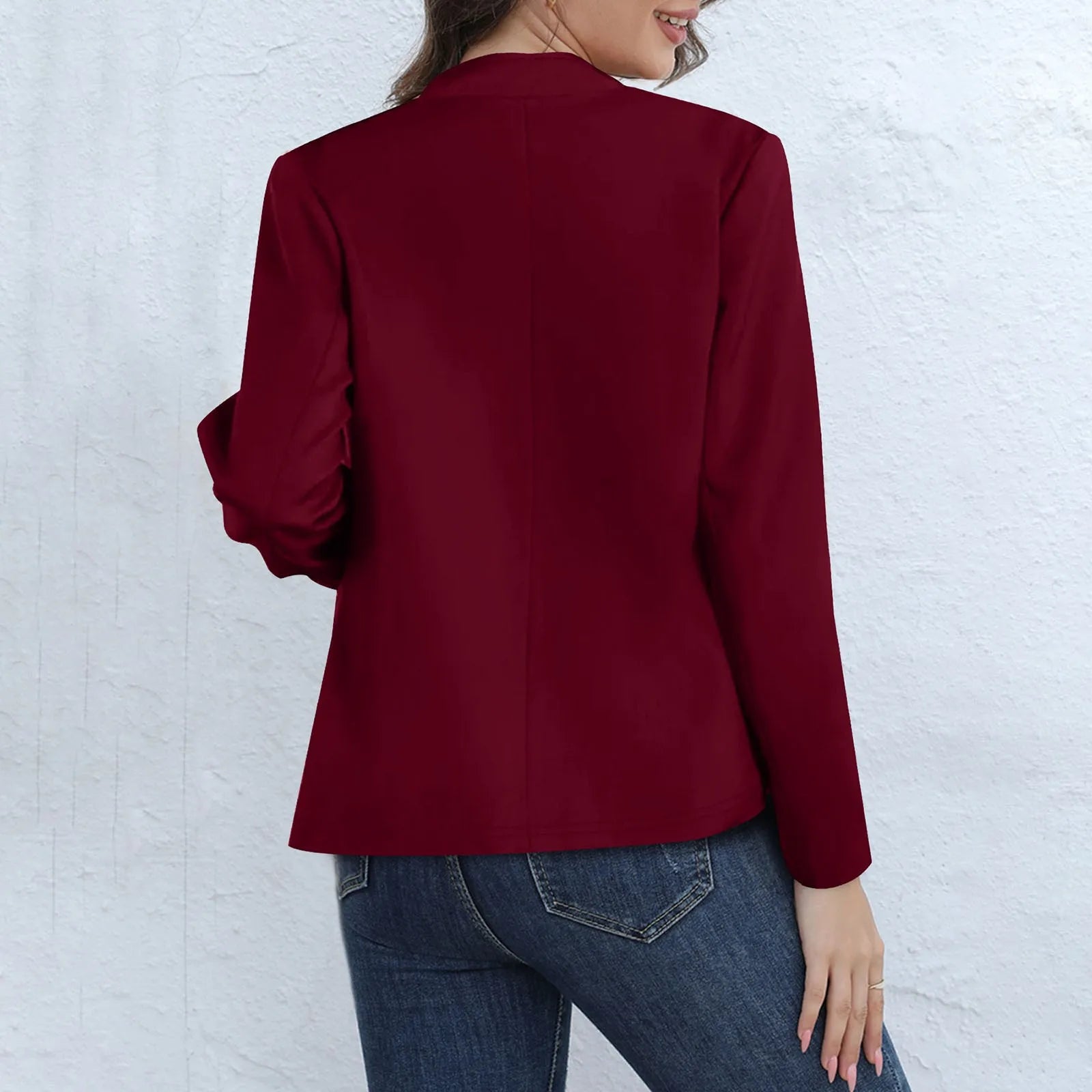 Lightweight women's blazer by Lamp Post for autumn and winter 2024, shown in a stylish, tailored fit perfect for chilly weather.