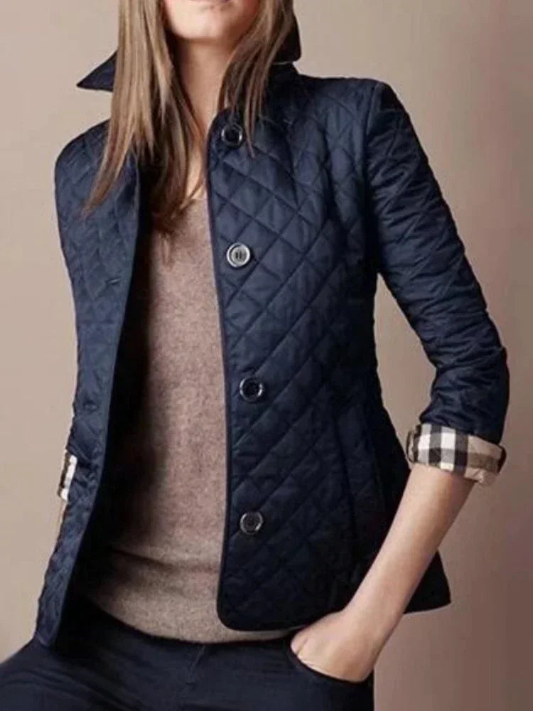 Red Lamp Post women's winter jacket in 4XL, warm coat with hood, suitable for winter weather and outdoor wear.