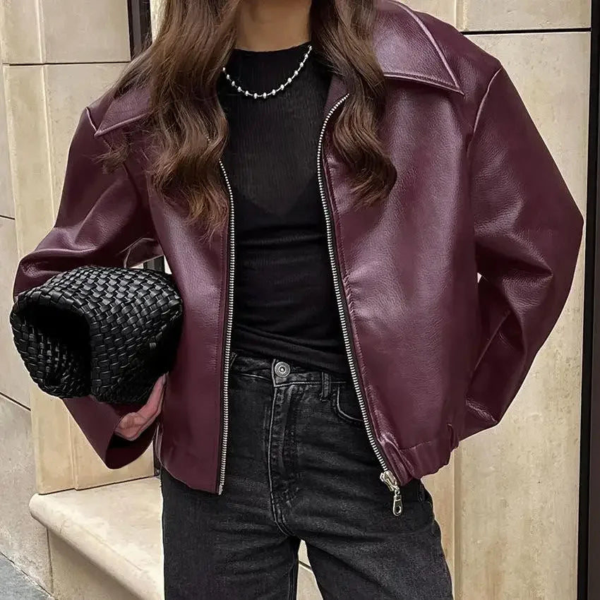 Red wine leather women's jacket by Lamp Post featuring long sleeves and a stylish, fitted design for fashionable wear.