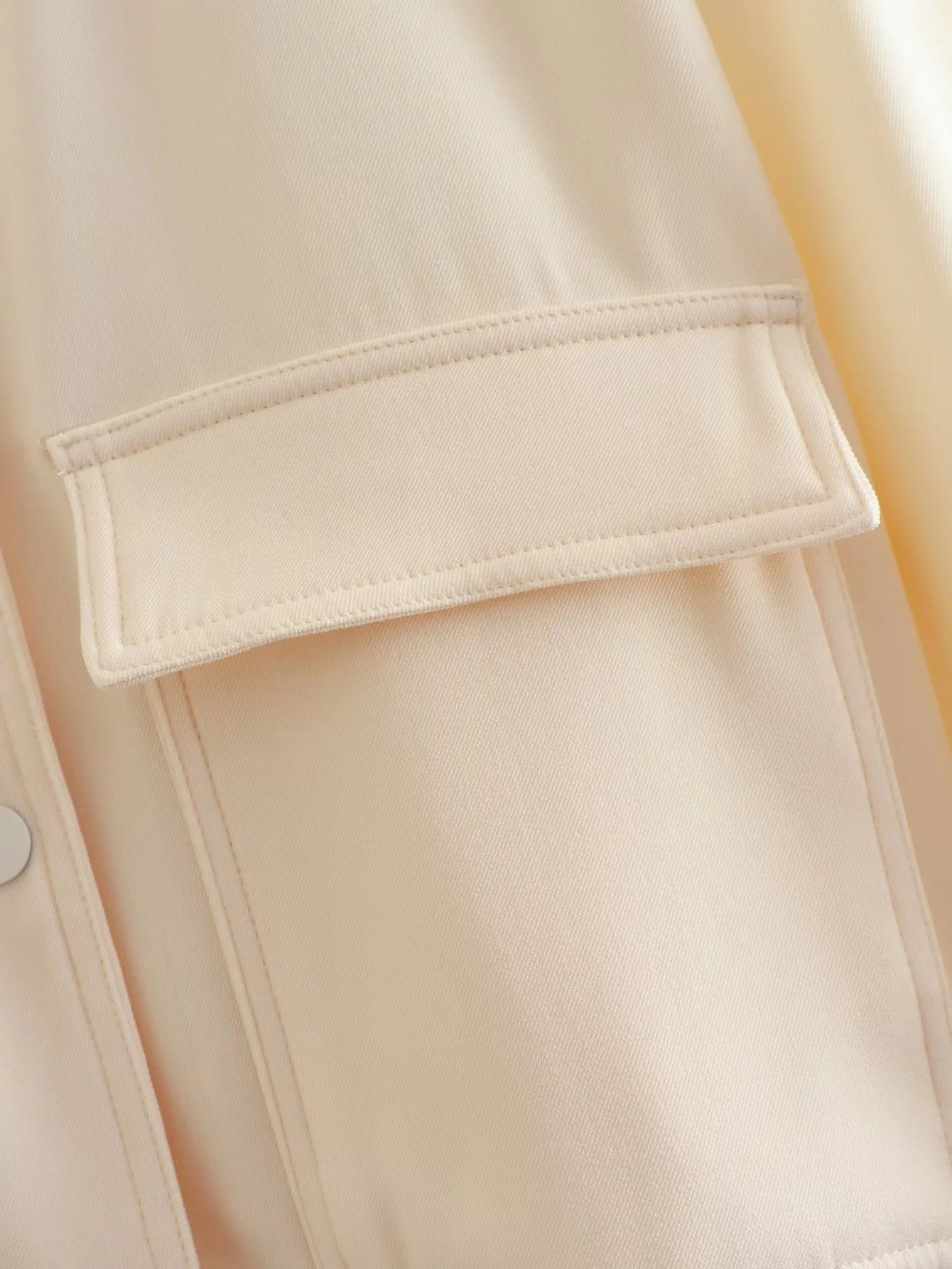 Beige Lamp Post women's long sleeve bomber jacket coat from 2024, stylish outerwear with a fitted silhouette and modern design.