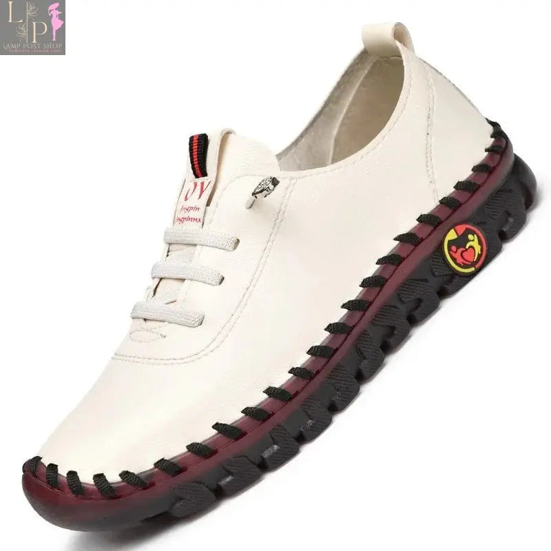 Leather women’s loafers with slip-on design, casual flats for women, stylish and comfortable leather shoes.