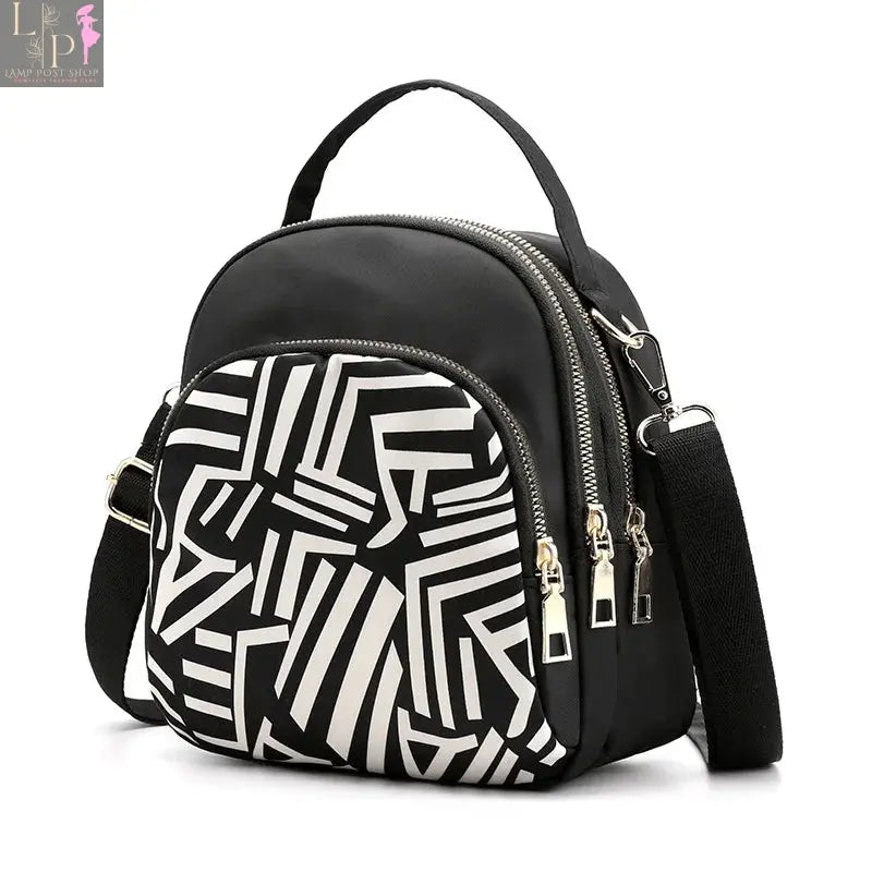Leather designer handbag for women, luxury shoulder bag with stylish pattern, spacious interior, and elegant craftsmanship.