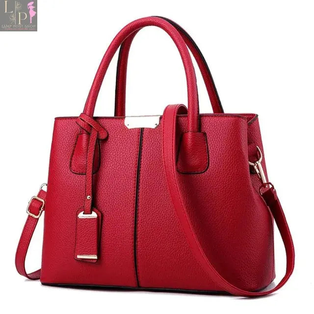 Leather designer handbag for women featuring a stylish pattern, luxury shoulder bag with spacious interior and elegant design.