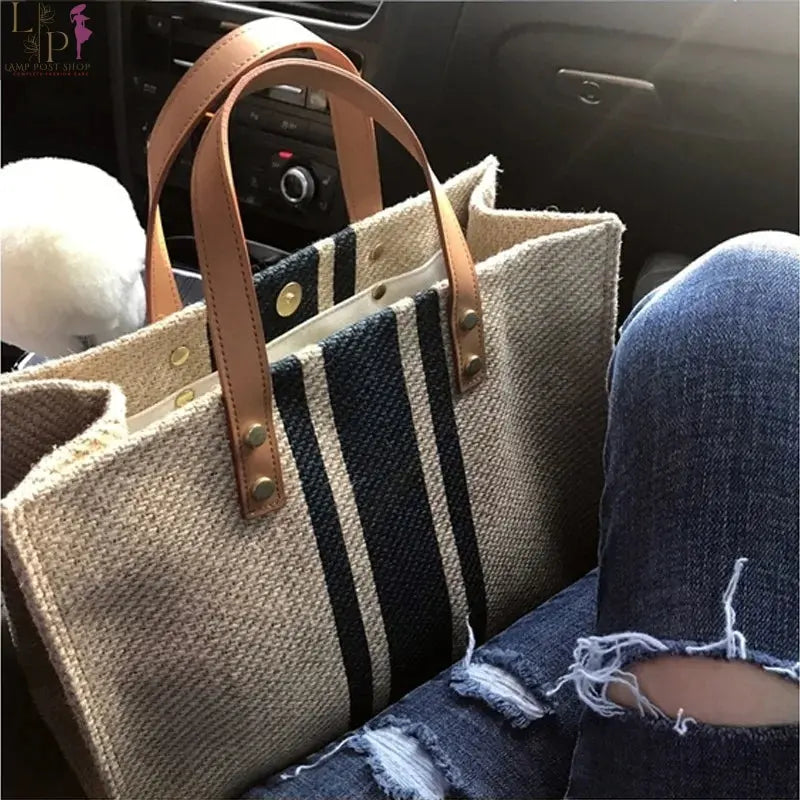 Leather women’s designer handbag by Yogodlns, featuring a stylish pattern, shoulder strap, and spacious interior for luxury fashion.