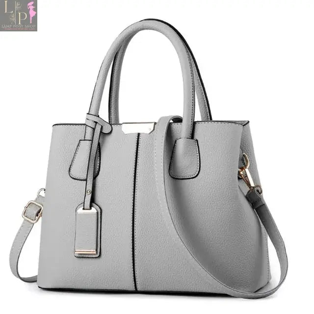 Yogodlns designer leather women’s handbag with pattern, luxury shoulder bag, stylish purse, and spacious interior.