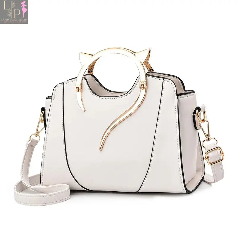 Small white leather shoulder bag from My Store, featuring a sleek design and adjustable strap for everyday use.