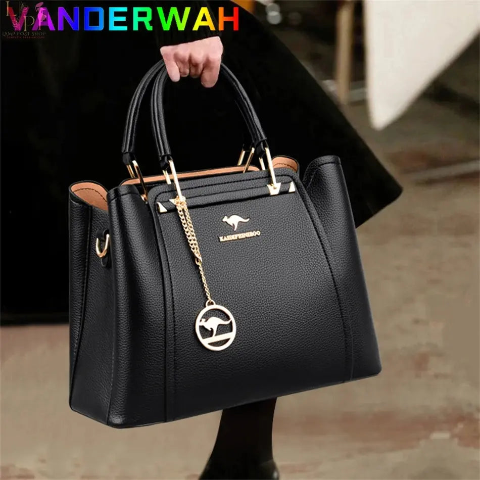 Green soft leather luxury handbag with three layers, shoulder strap, large capacity, and stylish design for women.
