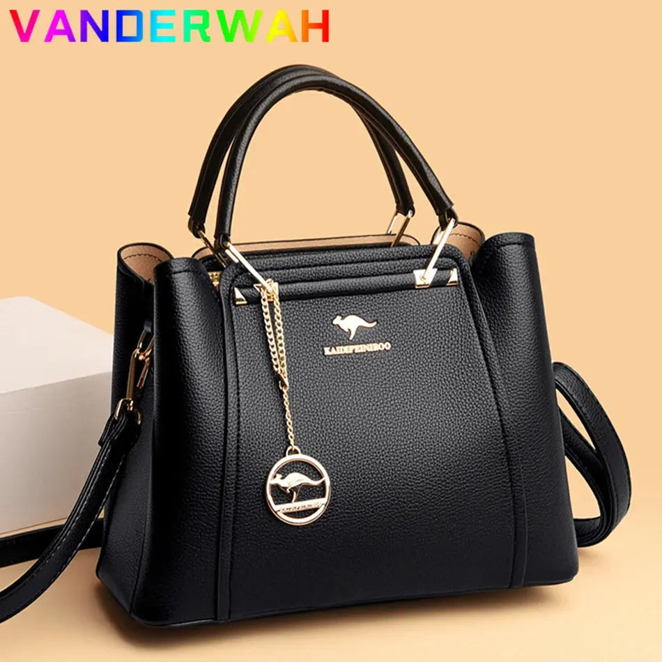Green soft leather luxury handbag with three layers, shoulder strap, and large capacity for women’s designer shopping and messenger use.