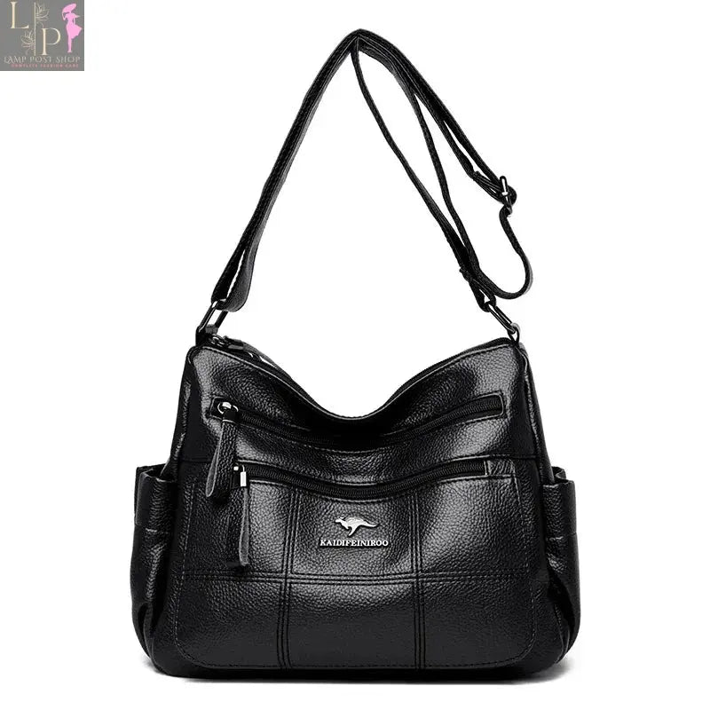 Green soft leather luxury handbag with three layers, shoulder strap, and large capacity for women, designer-style tote and messenger bag.