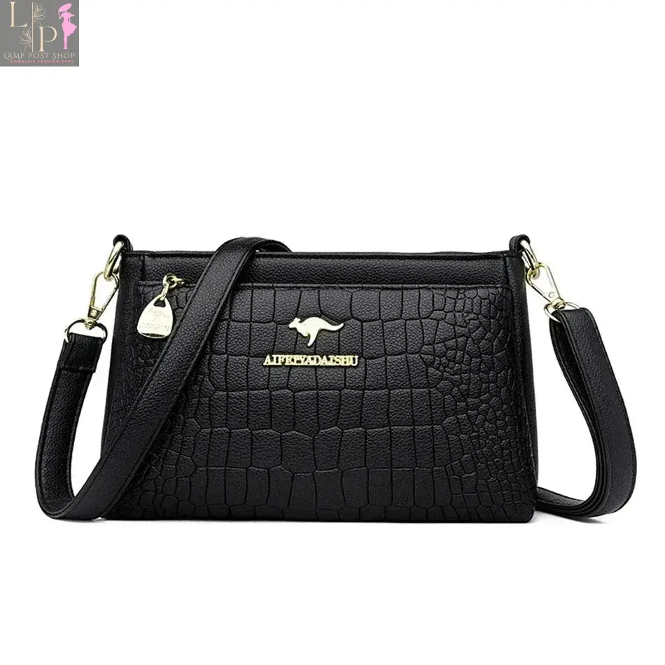Green soft leather luxury handbag with three layers, shoulder strap, crossbody style, large capacity tote for women.
