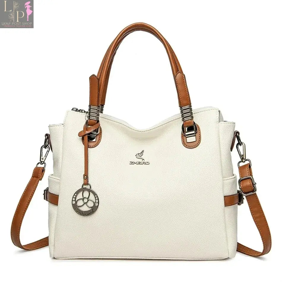 Green soft leather luxury handbag with 3 layers, shoulder strap, crossbody design, spacious tote for women, designer style.