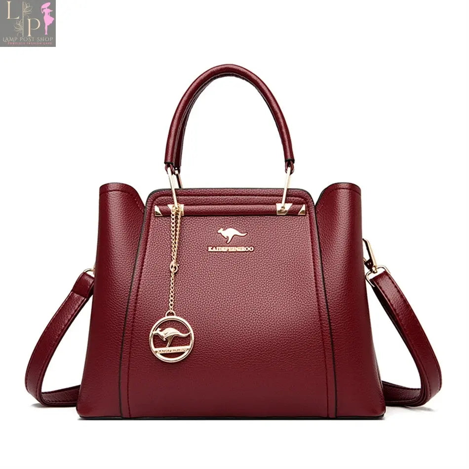 Green soft leather luxury handbag with 3 layers, shoulder strap, crossbody style, large capacity tote for women.