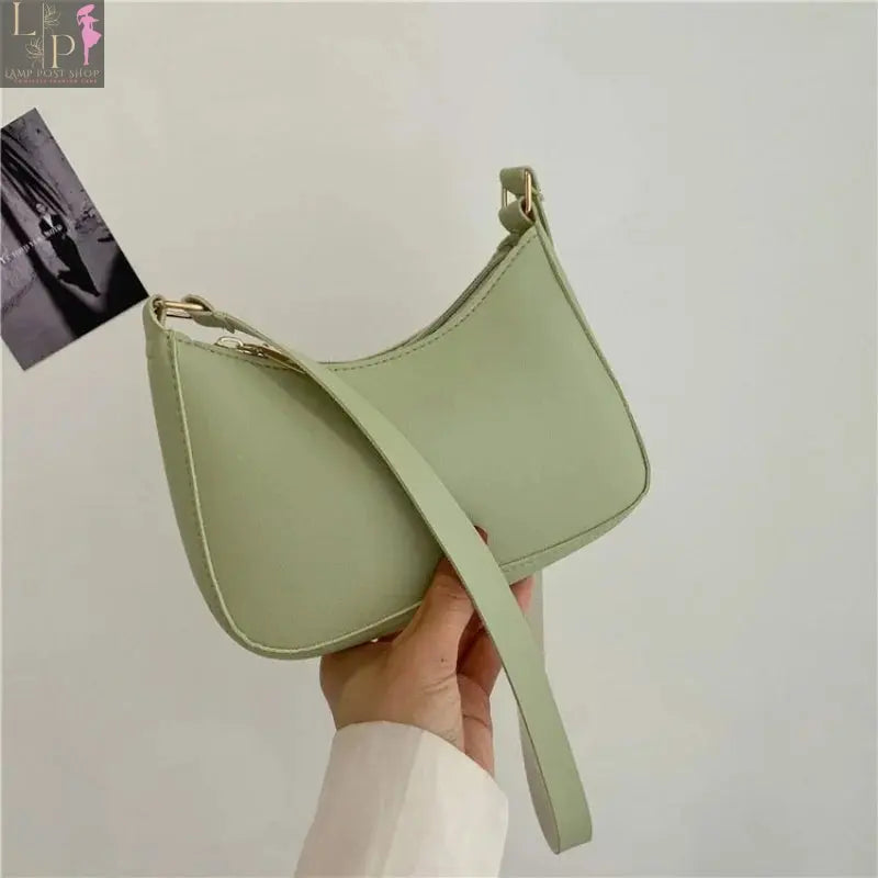 Khaki leather women's shoulder bag with casual hobo style, featuring a comfortable underarm design and spacious interior.