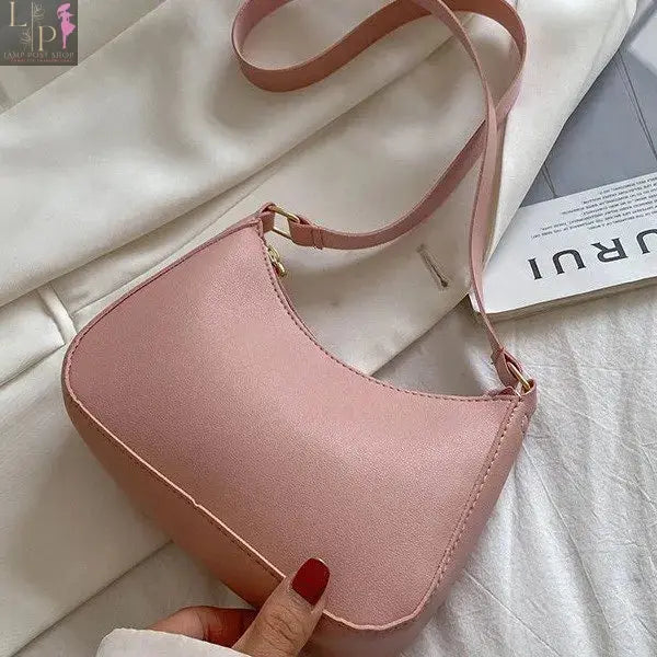 Khaki leather shoulder underarm bag for women, casual hobo style with hand straps, fashionable ladies' handbag.