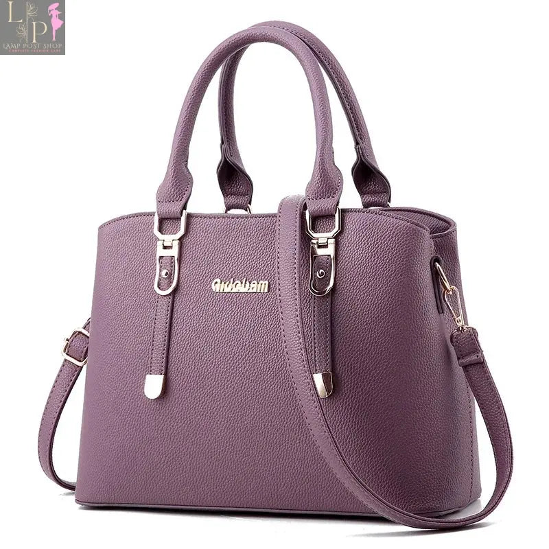 Leather women’s casual tote bag with top handles, spacious interior, in a stylish design, perfect for everyday use.