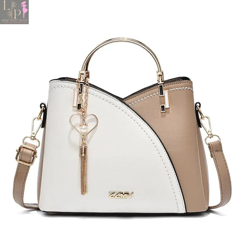 Wine-red women’s shoulder bag by My Store with white accents, stylish leather bag for everyday use and casual outings.