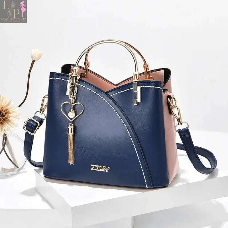 Wine-red women’s shoulder bag with white accents, stylish and spacious, made by My Store.