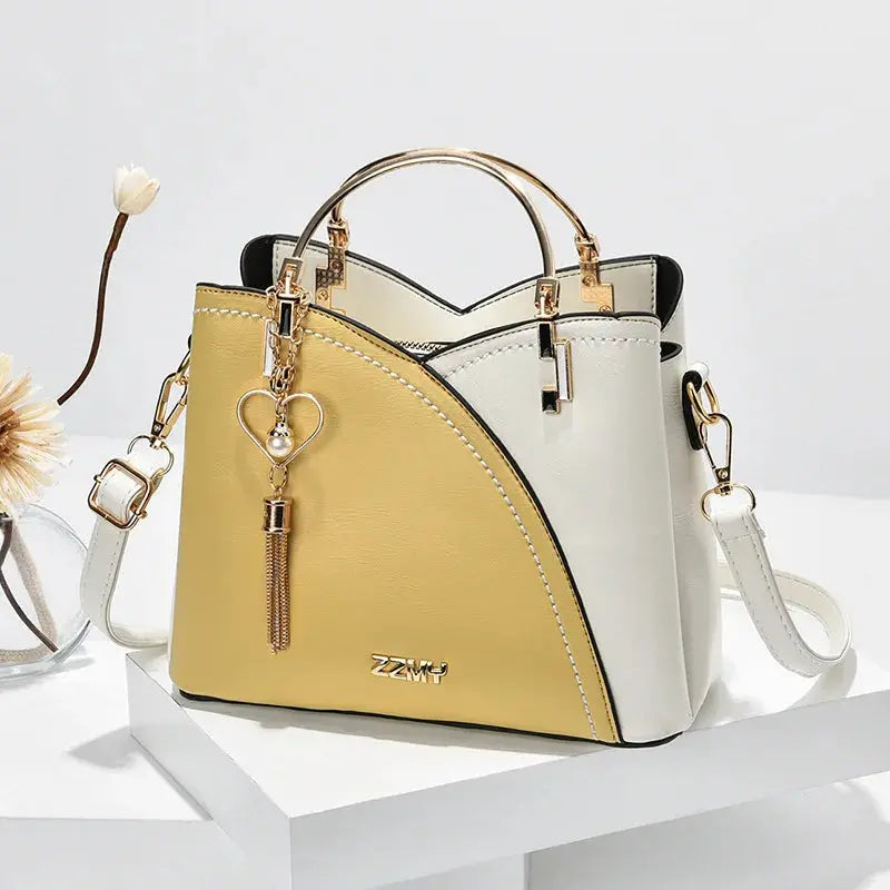 Wine red women’s shoulder bag by My Store featuring a sleek design and white accents, perfect for everyday use.