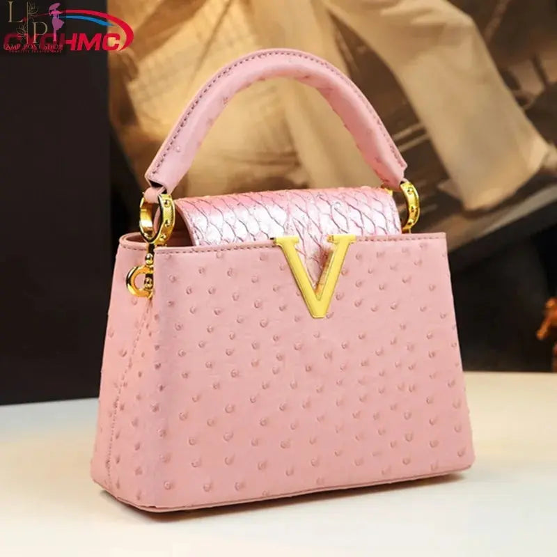 Pink crossbody purse from My Store with adjustable strap and gold-tone hardware, stylish and perfect for everyday use.
