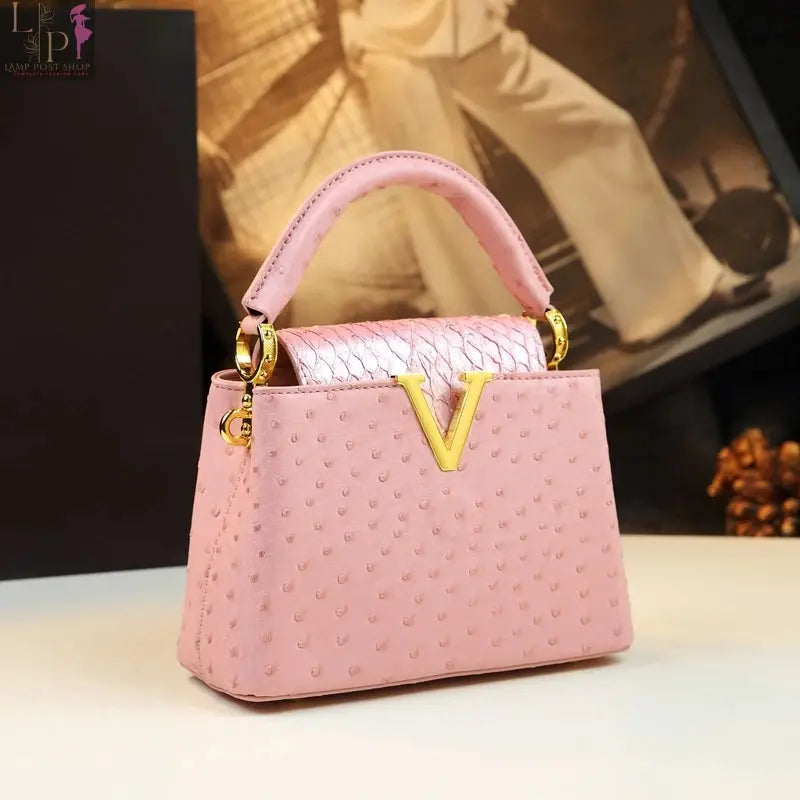 Pink crossbody purse by My Store featuring a sleek design and adjustable strap, perfect for casual or evening outings.