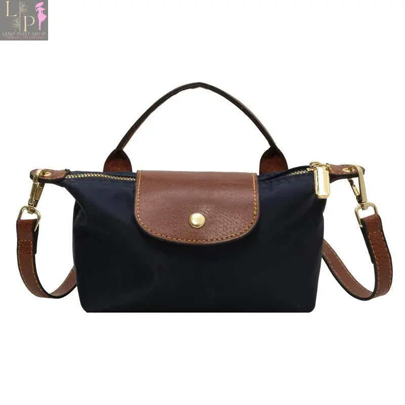 Black women and girls crossbody bag for 2024, featuring a sleek design with adjustable strap and stylish finish.