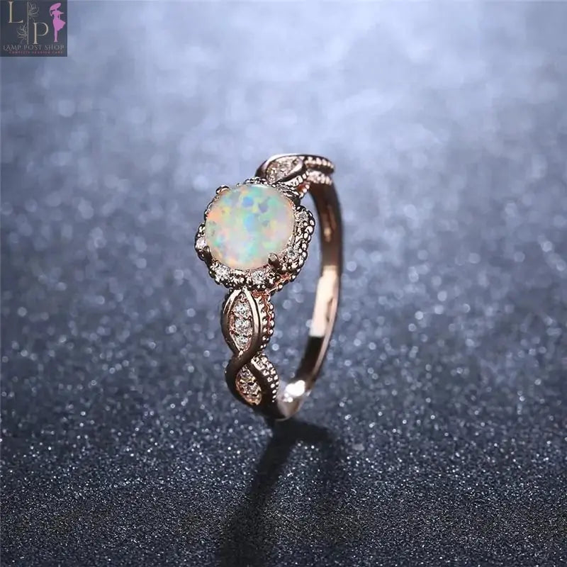 Rainbow opal jewelry ring featuring vibrant colors, perfect for gift-giving to a girlfriend or wife.