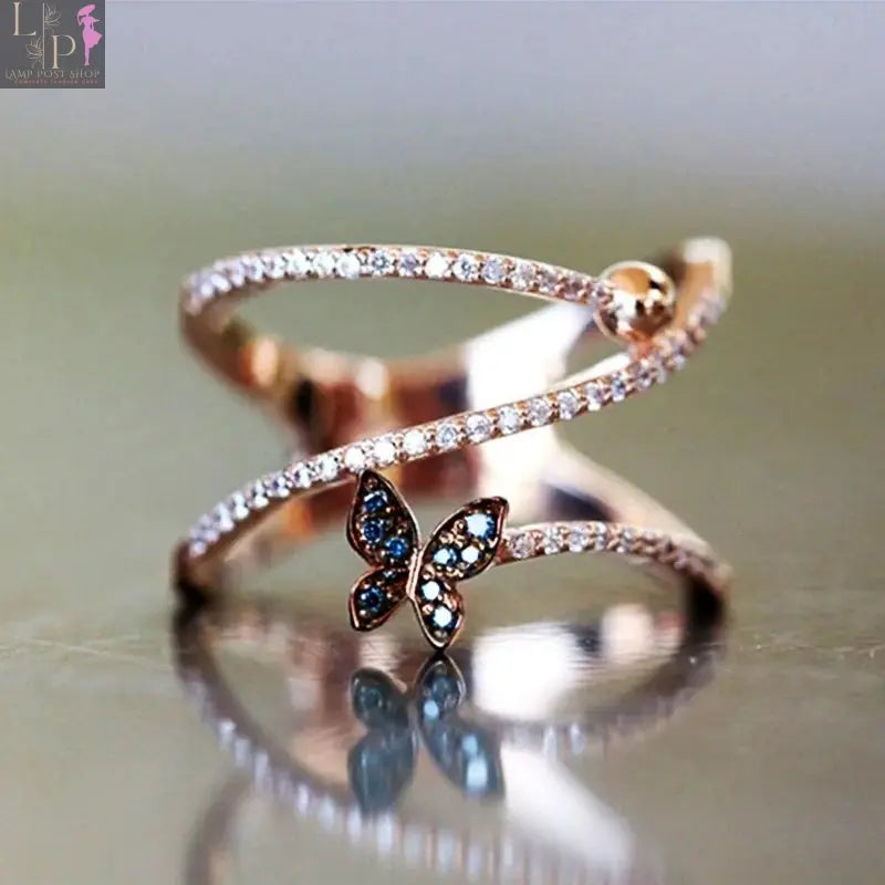 Rose gold butterfly-shaped ring from My Store with delicate butterfly designs and a polished finish, size 8.