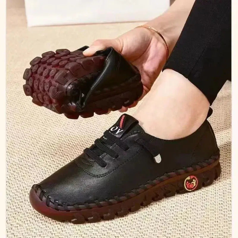 White summer flat shoes for women, orthopedic loafers with slip-on design, stitched moccasins, ideal for casual and comfort wear.
