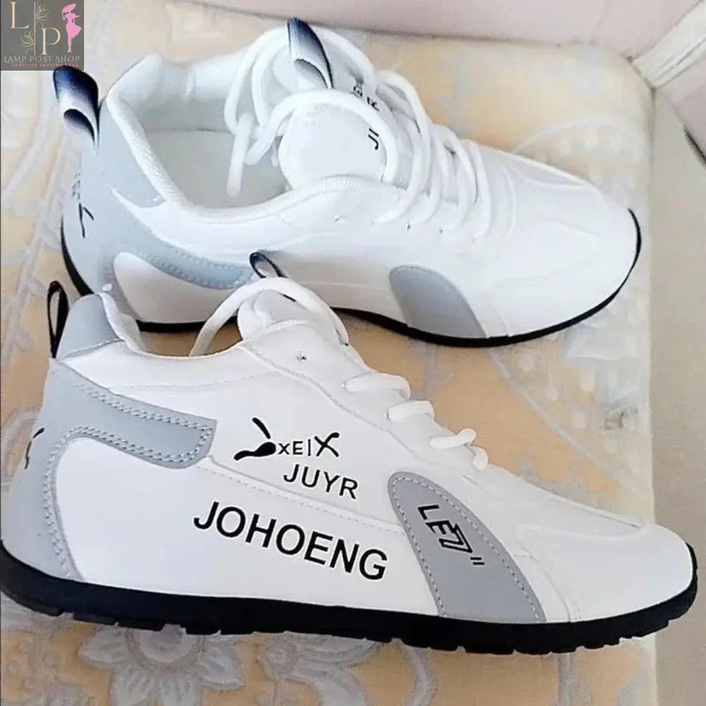 White women's summer lace-up sneakers, casual platform sports shoes for walking and everyday wear, designed for comfort and style.