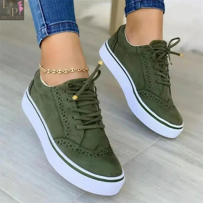 White women's round toe casual flat shoes with lace-up design, ideal for walking and versatile everyday comfort.