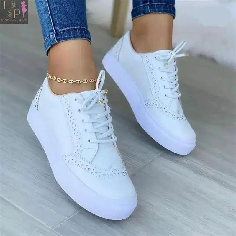 White women's round toe casual flat shoes with lace-up design, versatile and comfortable for walking and everyday wear.
