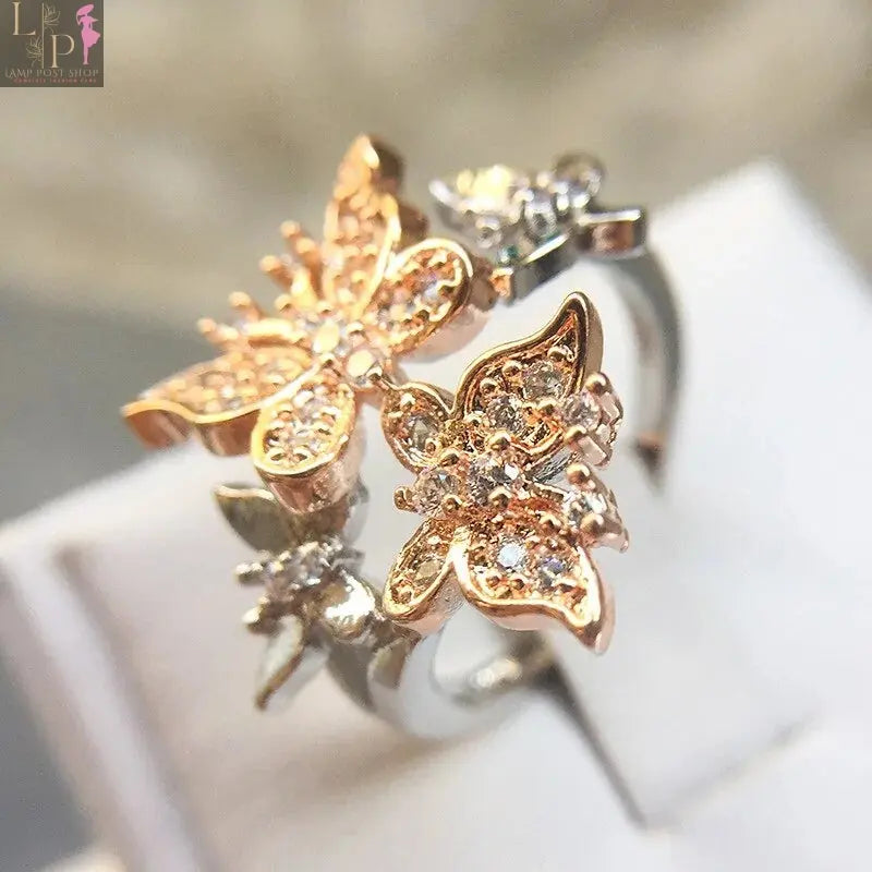 White gold butterfly engagement ring with intricate butterfly design and sparkling gemstone accents, crafted by My Store.