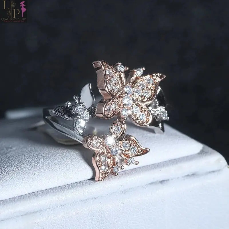 White butterfly-shaped engagement ring from My Store featuring intricate design and sparkling details.