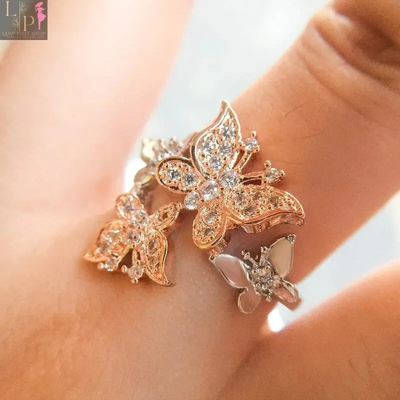 White butterfly-shaped engagement ring from My Store featuring intricate detailing and a delicate band.